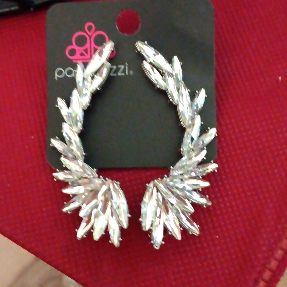 Paparazzi silver tone with crystal angel wings.